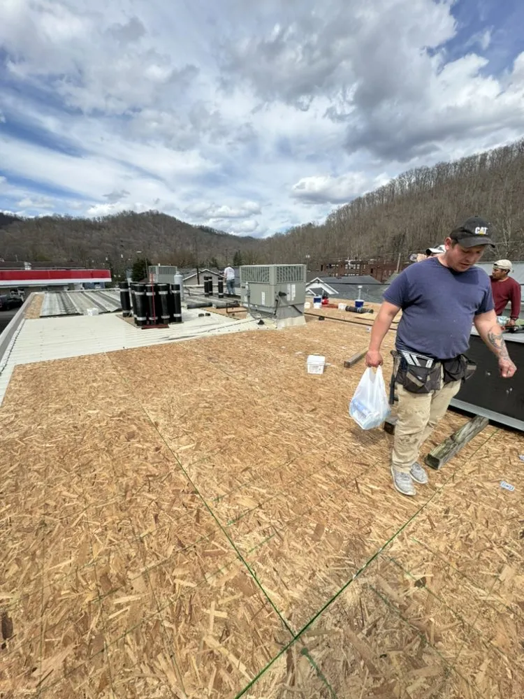 Licensed flat roof repair in Gilbert, WV by Trent and Son’s Roofing