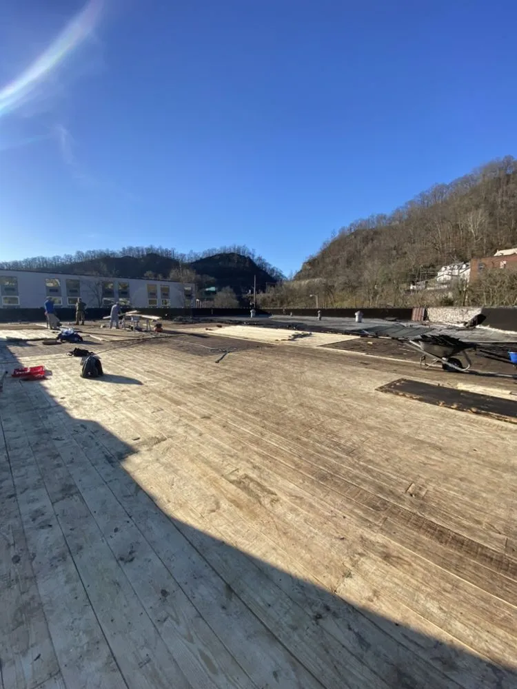 Licensed shingle roofing service for residential properties in Gilbert, WV by Trent and Son’s Roofing