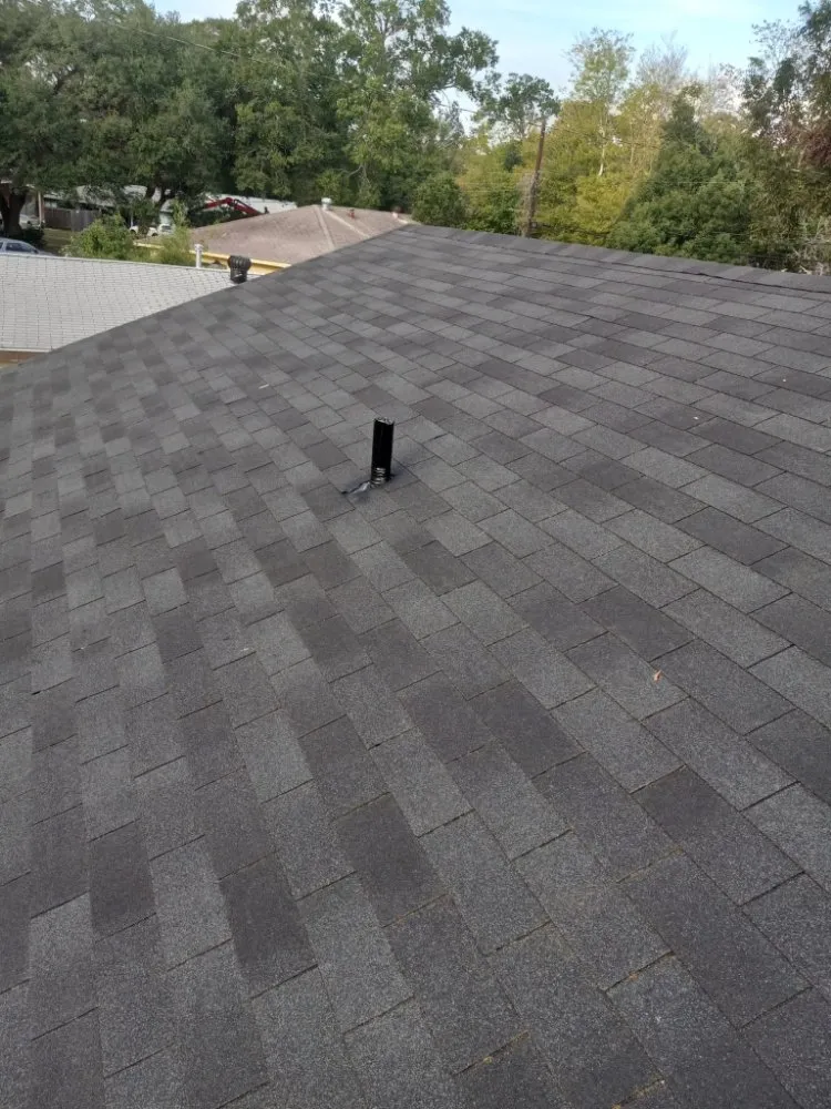 Slide of Tres Coronas Roofing