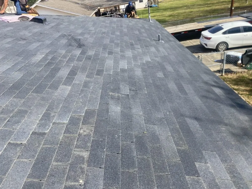 Slide of Tres Coronas Roofing