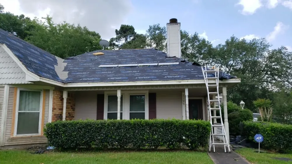 Slide of Tres Coronas Roofing