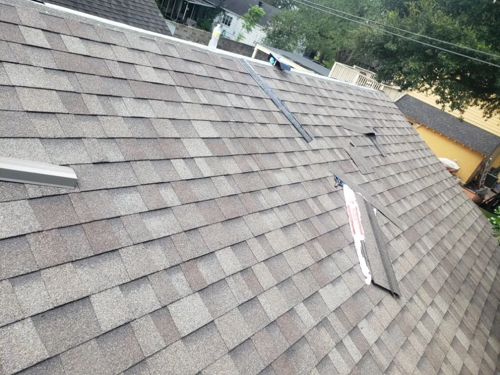 Slide of Tres Coronas Roofing