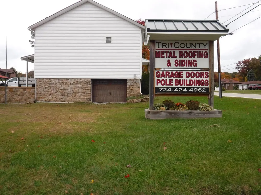 Emergency roof leak repair after storm damage in Acme, PA by Tri County Doors & Builders