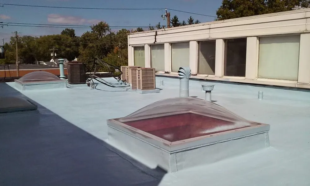 Slide of Tri-Kote Roofing