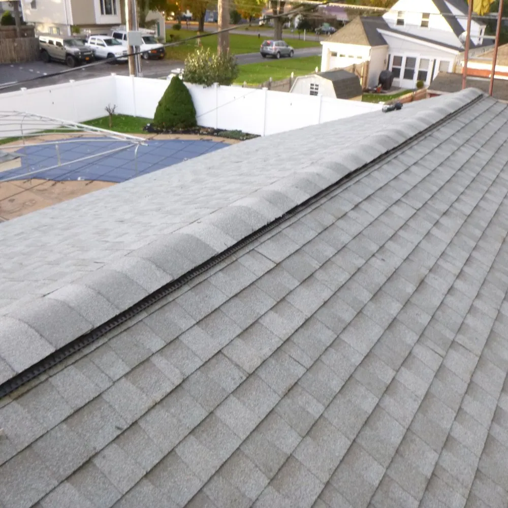 Slide of Tri-Town Roofing & Construction, Inc