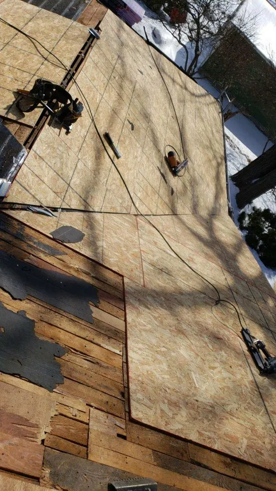 Slide of Triad Roofing & Construction Services