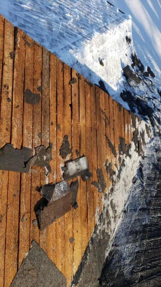 Slide of Triad Roofing & Construction Services