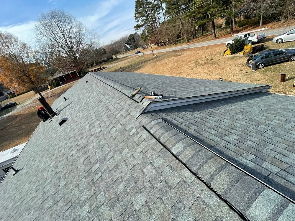 Slide of Triangle Elite Roofing