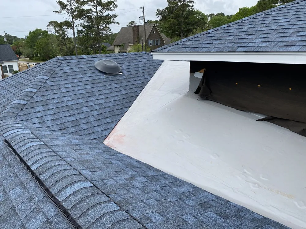 Slide of Triangle Elite Roofing