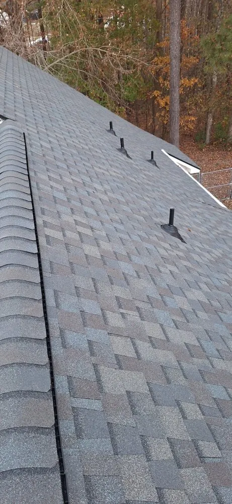 Slide of Triangle Elite Roofing