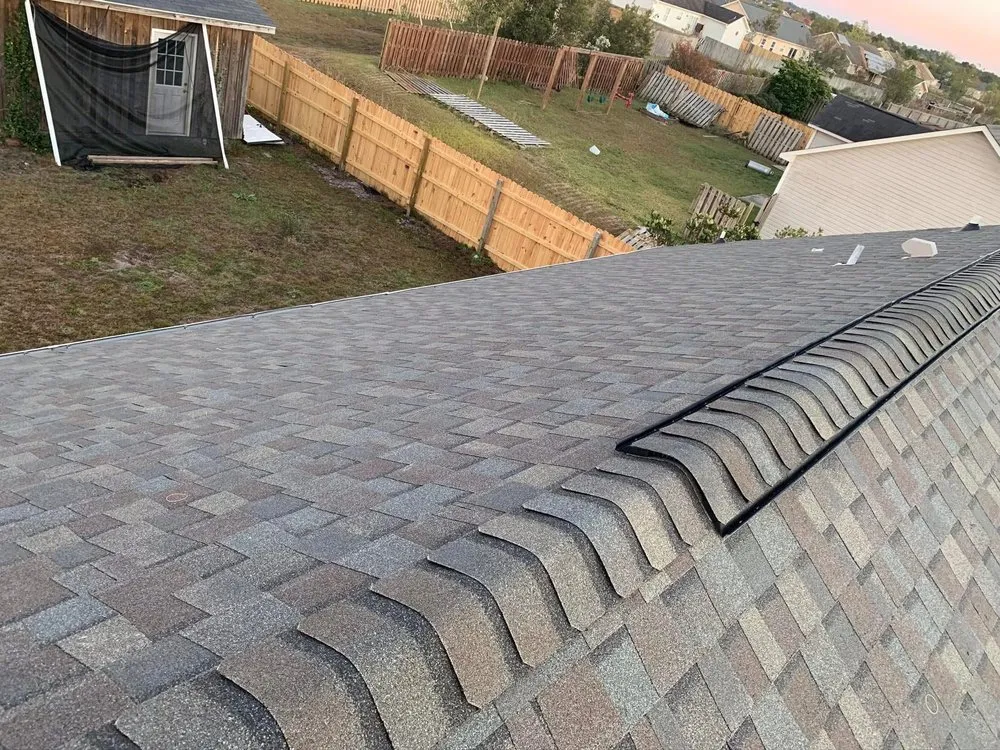 Slide of Triangle Elite Roofing
