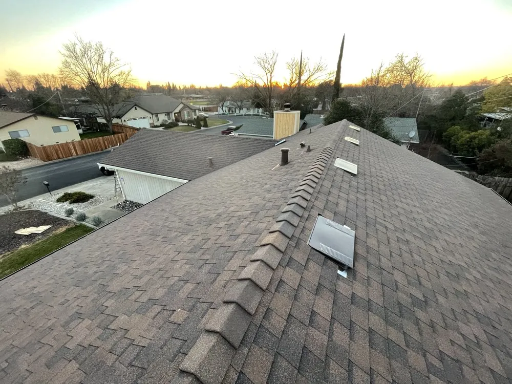 Slide of Triark Roofing