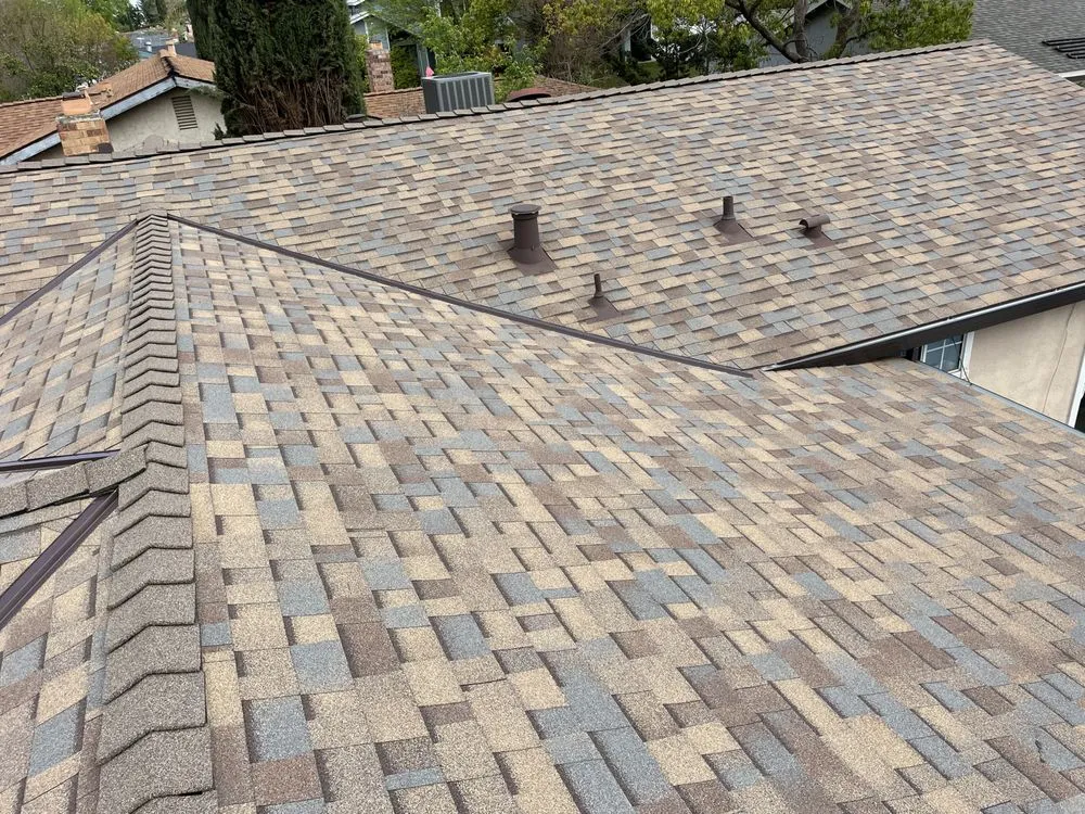 Slide of Triark Roofing