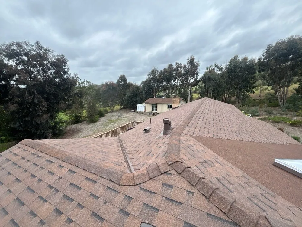 Slide of Triark Roofing