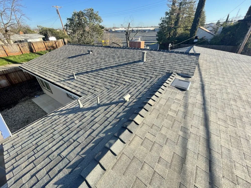 Slide of Triark Roofing