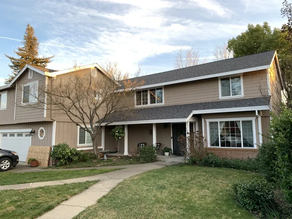 Slide of Triark Roofing