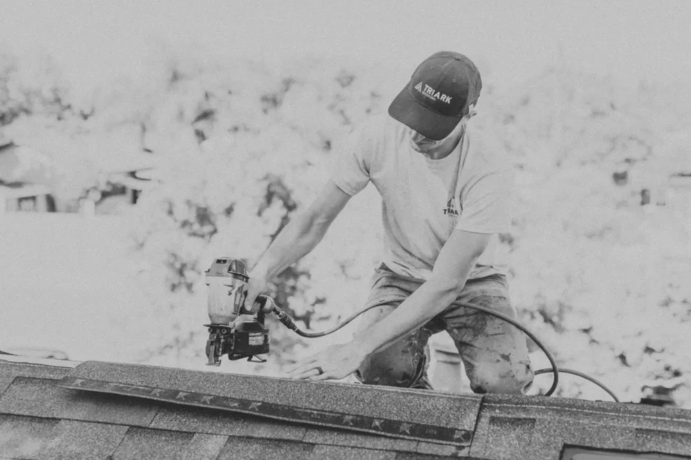 Slide of Triark Roofing