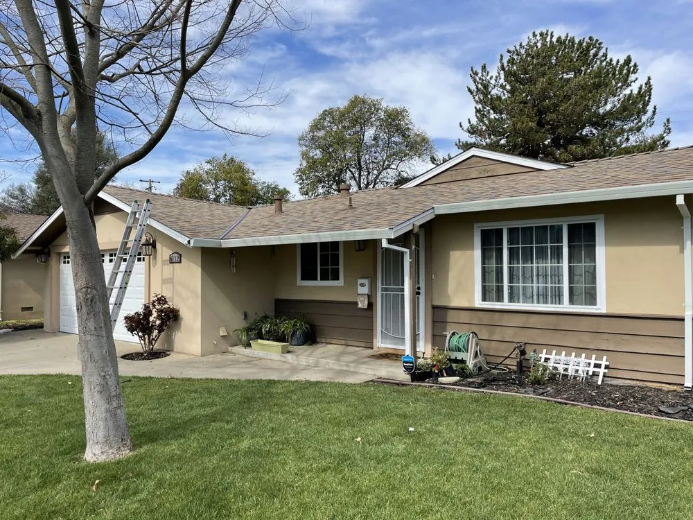 Slide of Triark Roofing