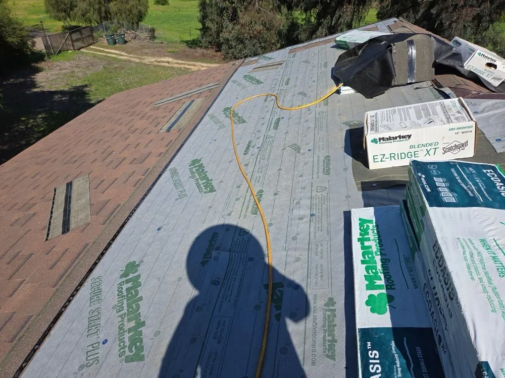 Slide of Triark Roofing