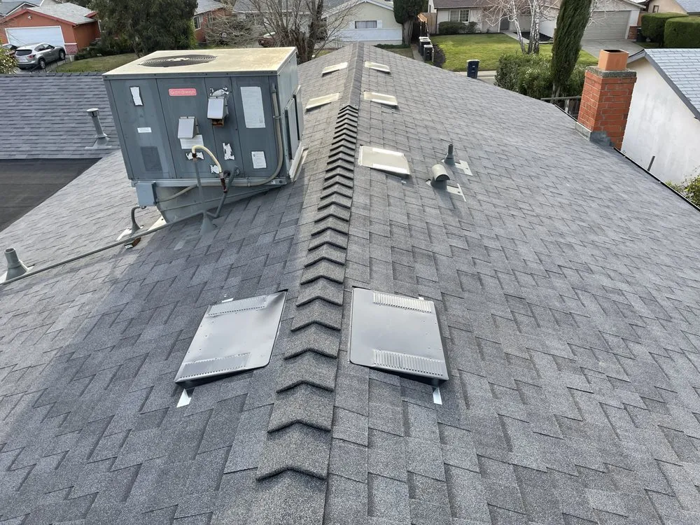 Slide of Triark Roofing