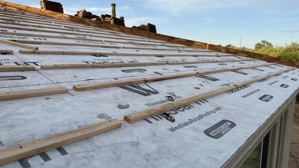 Slide of Trident Roofing