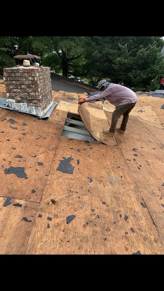 Slide of Trifecta Roofing and Restoration