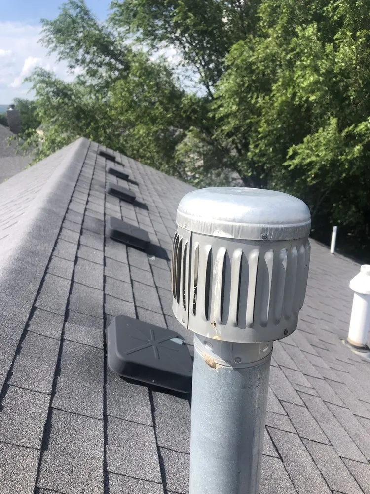 Slide of Trifecta Roofing and Restoration