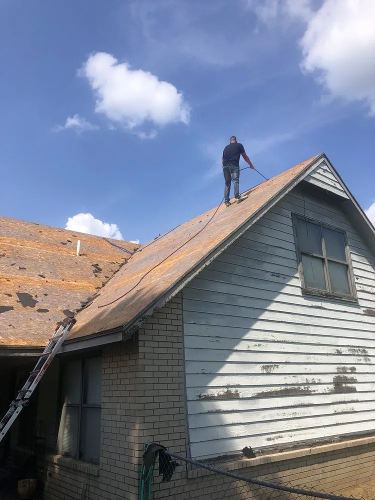 Slide of Trifecta Roofing and Restoration