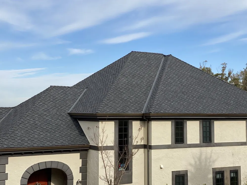 Slide of Trigon Roofing