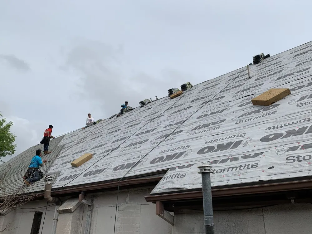 Slide of Trinity Roofing & Restoration