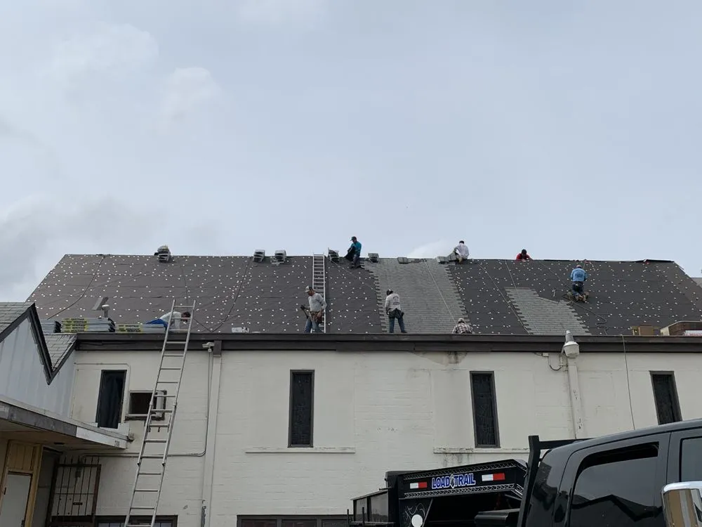 Slide of Trinity Roofing & Restoration