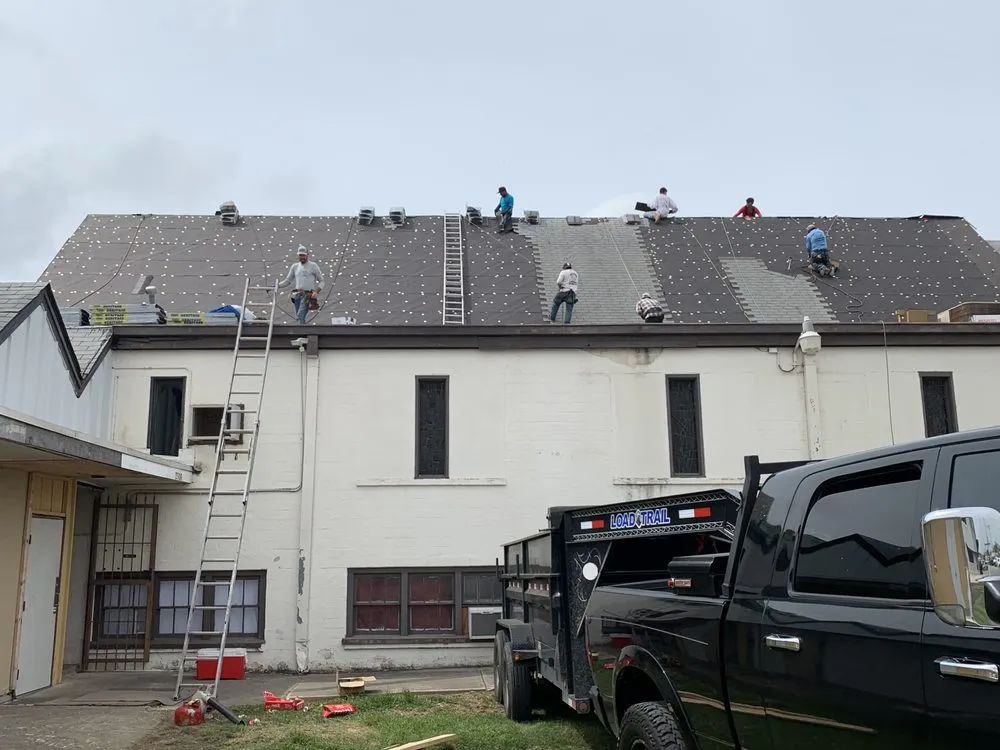 Slide of Trinity Roofing & Restoration