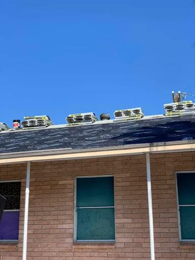 Slide of Trinity Roofing & Restoration