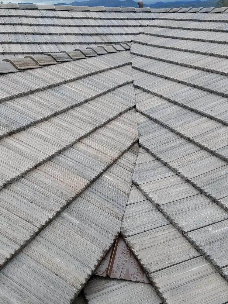 Slide of Trinity Roofing