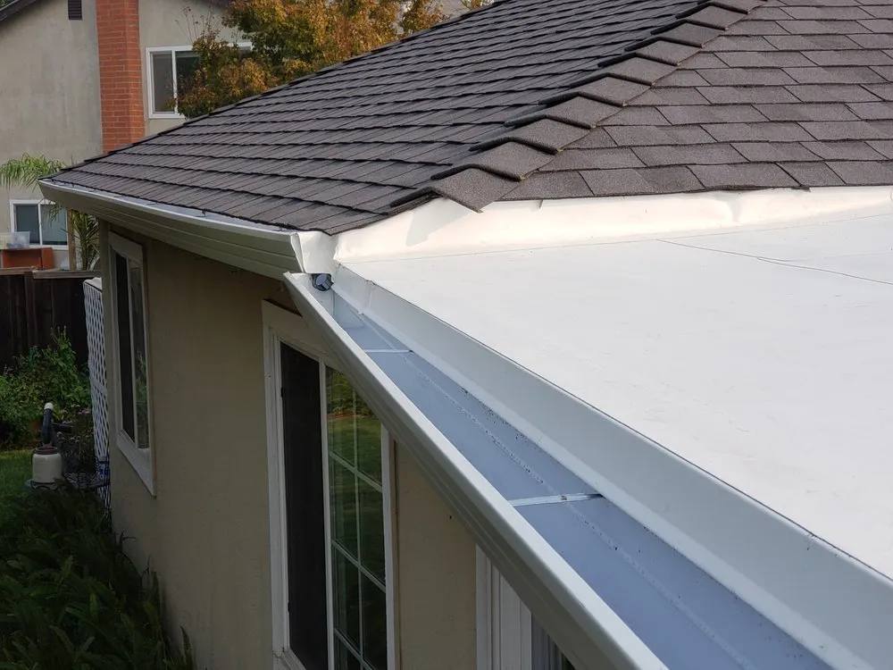 Slide of Trinity Roofing