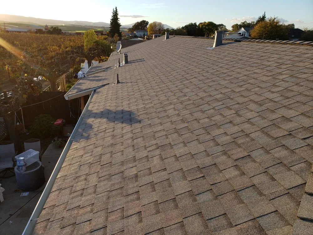 Slide of Trinity Roofing