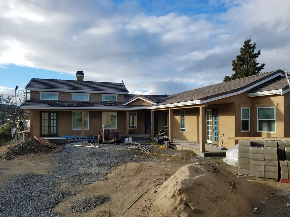 Slide of Trinity Roofing