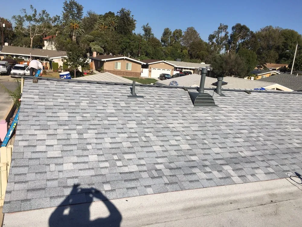 Slide of Trinity Roofing L & R Brothers