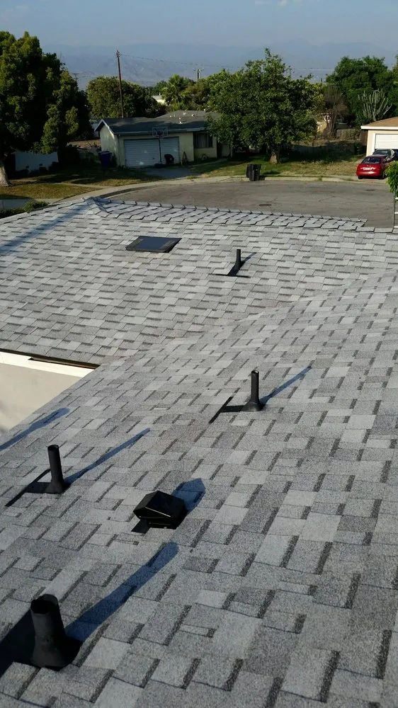 Slide of Trinity Roofing L & R Brothers