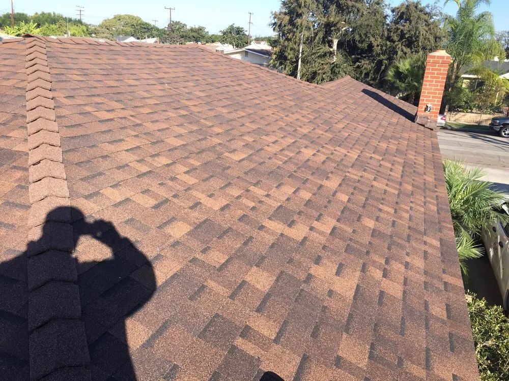 Slide of Trinity Roofing L & R Brothers