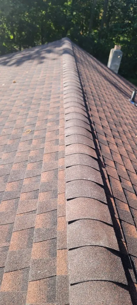 Slide of Trinity Roofing Service