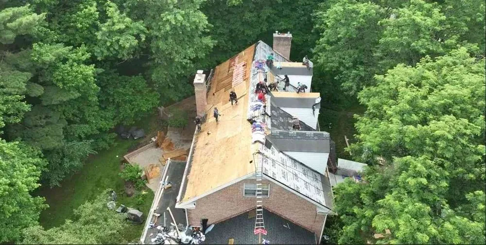 Slide of Trinity Roofing Services