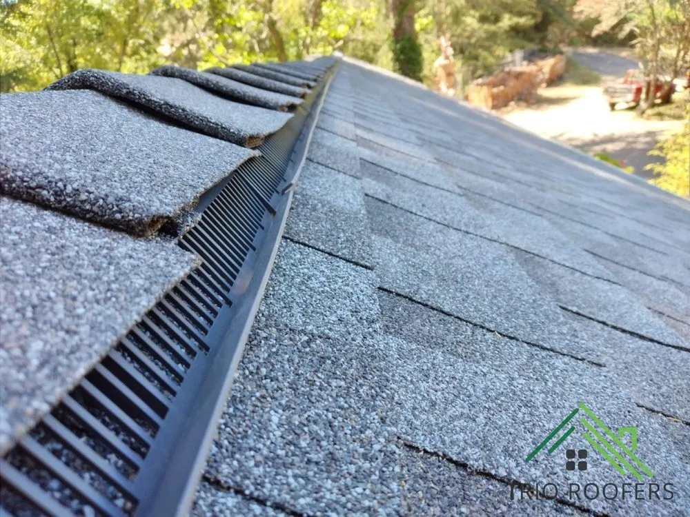 Slide of Trio Roofers