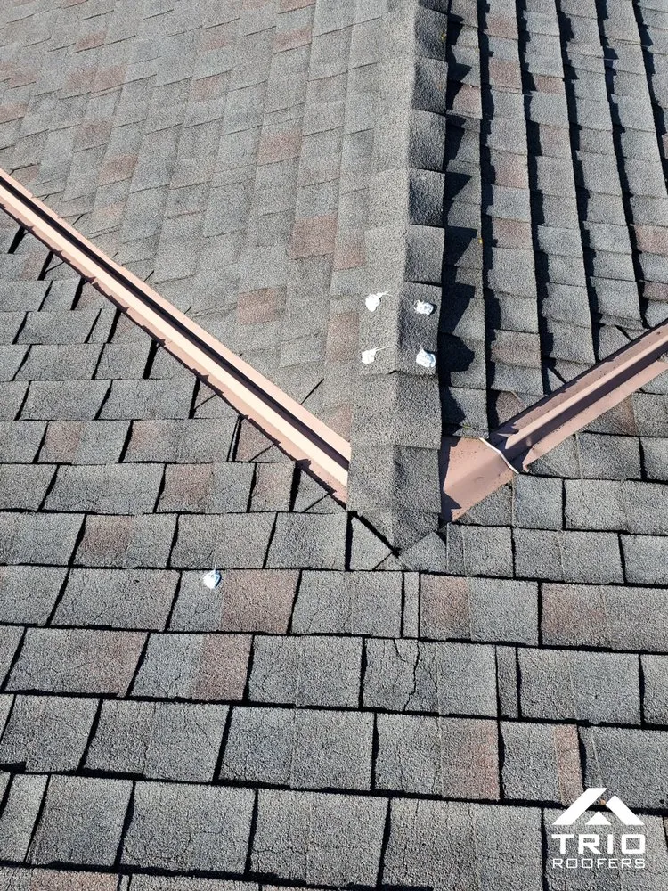 Slide of Trio Roofers