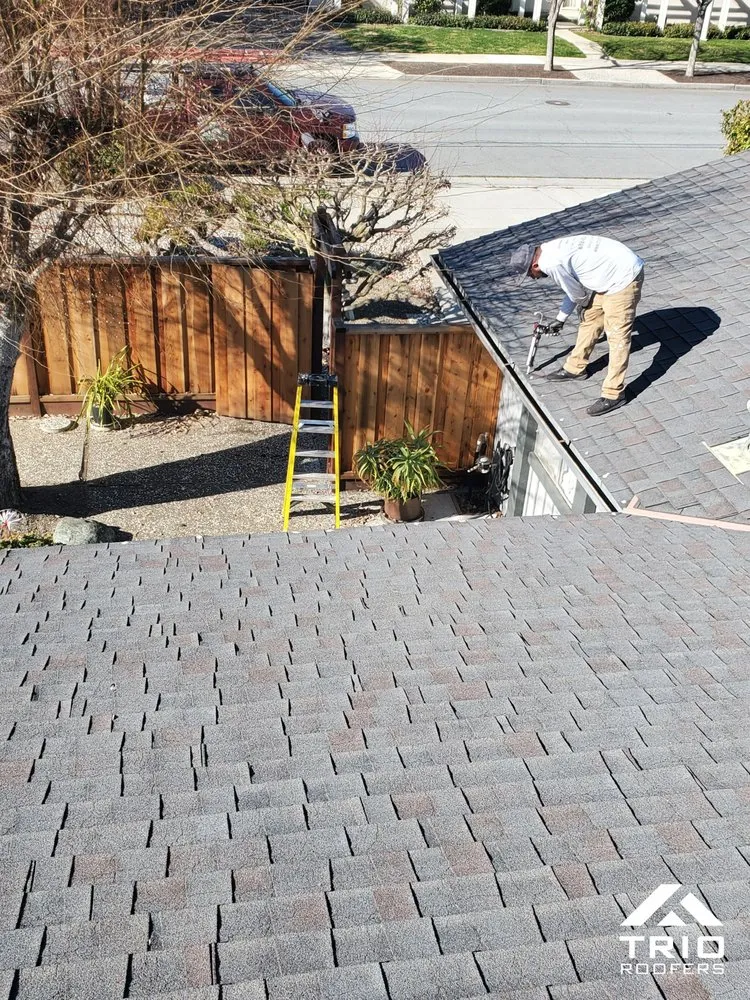 Slide of Trio Roofers