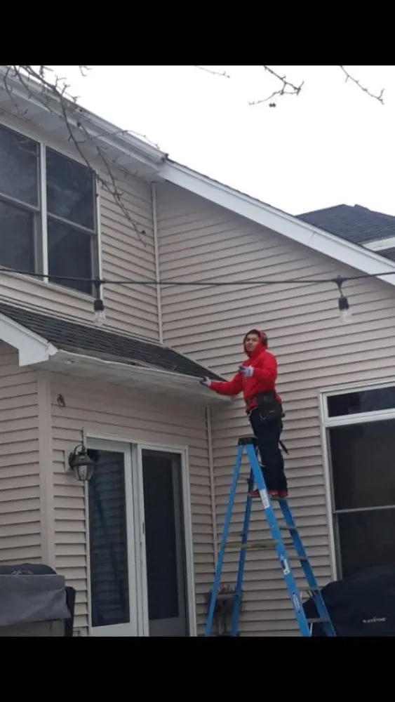 Slide of Triple GGG's Seamless Gutters