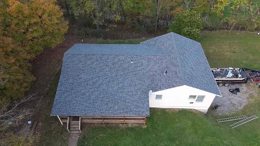 Slide of Triple H Roofing