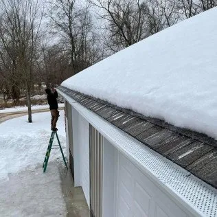 Slide of Triple J Gutters