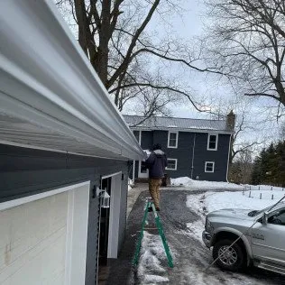 Slide of Triple J Gutters