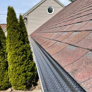 Slide of Triple J Gutters